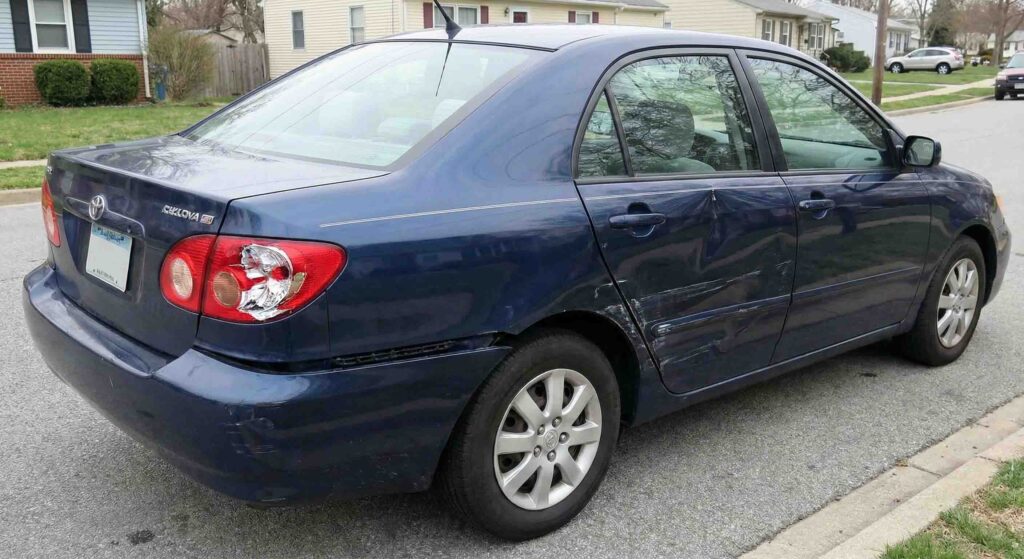 Damaged vehicle after hit and run accident in Fallbrook